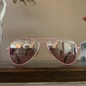 Little girl’s Ray-Ban sunglasses